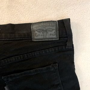 Levi 311 black shaping skinny jeans; size 28